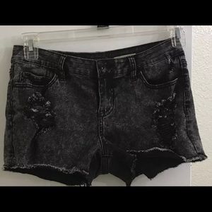 Black distressed shorts
